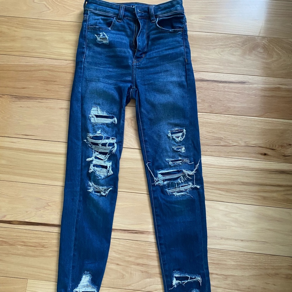 AEO distressed denim jeans with patched holes. Size women’s 00 short.
